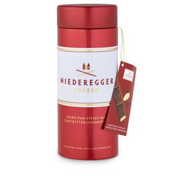 Продуктови Категории Шоколади Niederegger Метална кутия с 8 шоколада с пълнеж от фин бадемов крем и черен шоколад 320 гр